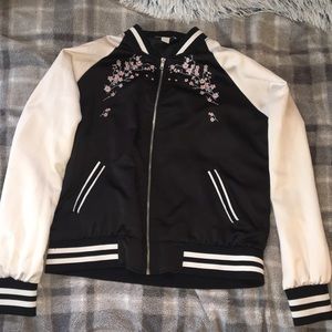 Charlotte Russe bomber jacket with floral design